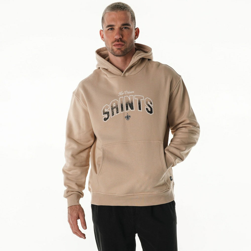 New Orleans Saints The Wild Collective Unisex Oversized Graphic Fleece Hoodie - Tan Hoodies