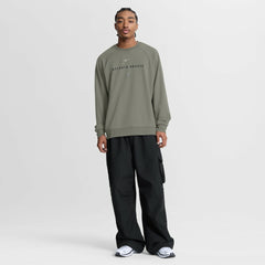 Atlanta Braves Nike Statement Primary Raglan Dri-FIT Sweatshirt - Olive Sweatshirts
