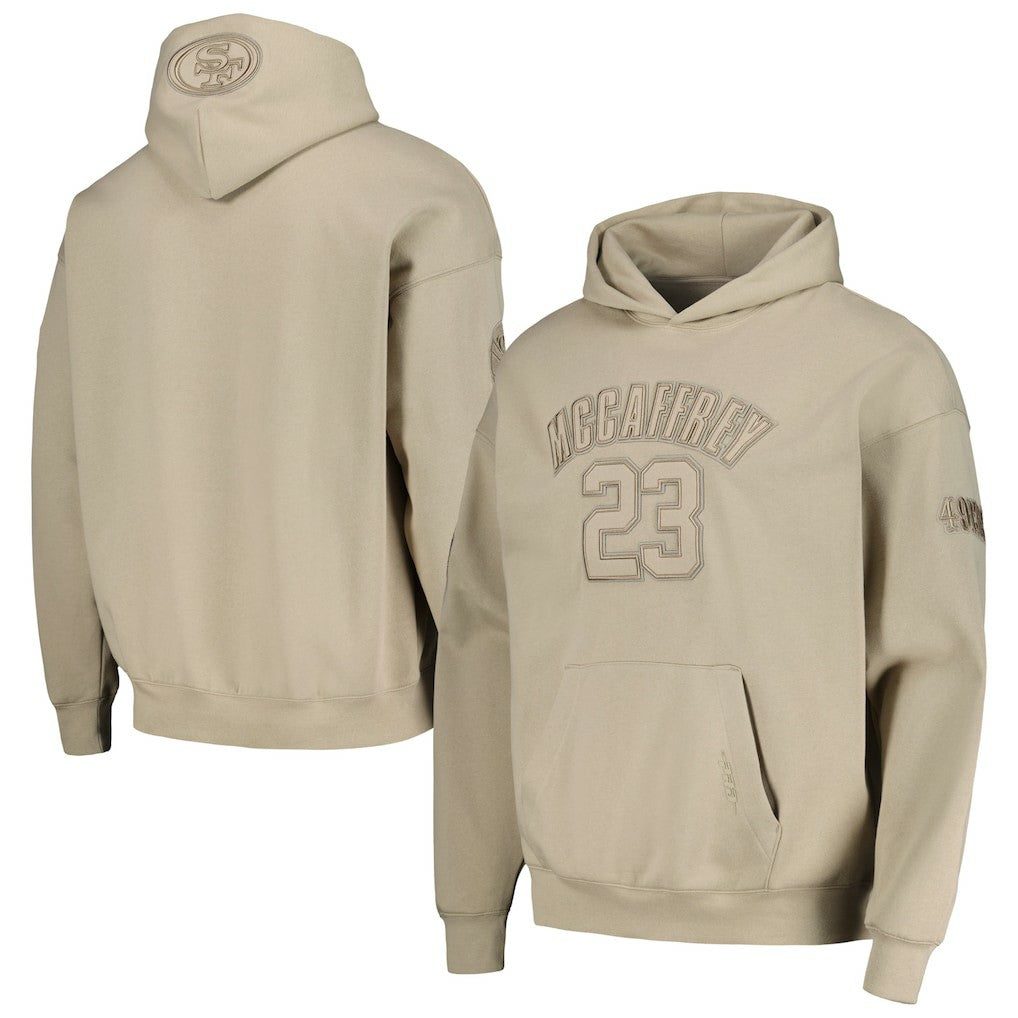 Christian McCaffrey San Francisco 49ers Pro Standard Player Name & Number Pullover Hoodie - Tan Hoodies