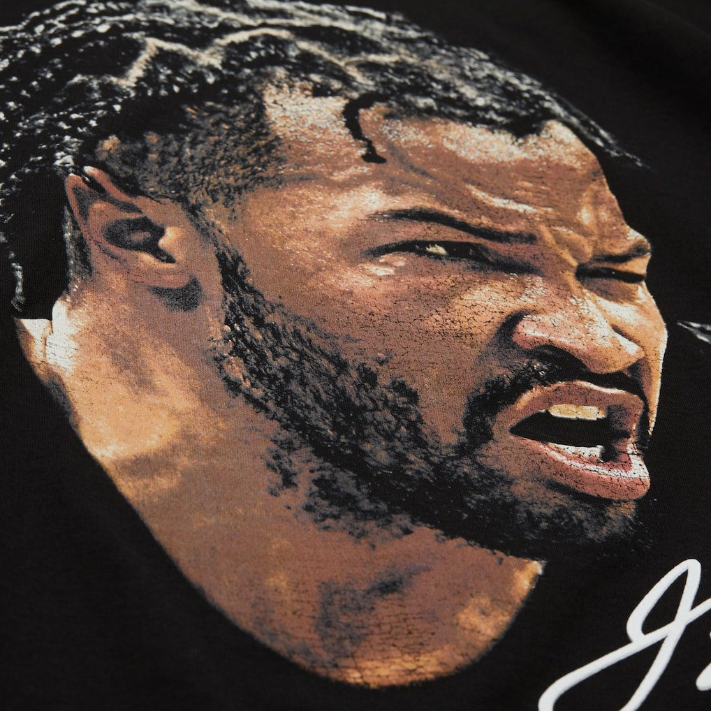 Jalen Brunson NBA Unisex Real Big Face Player T-Shirt Black - Mitchell & Ness