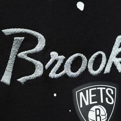 Brooklyn Nets Women's Courtside Splatter Cropped T-Shirt Black - Nike